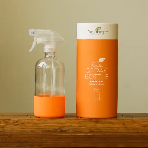 Glass Spray Bottle with Orange Sleeve